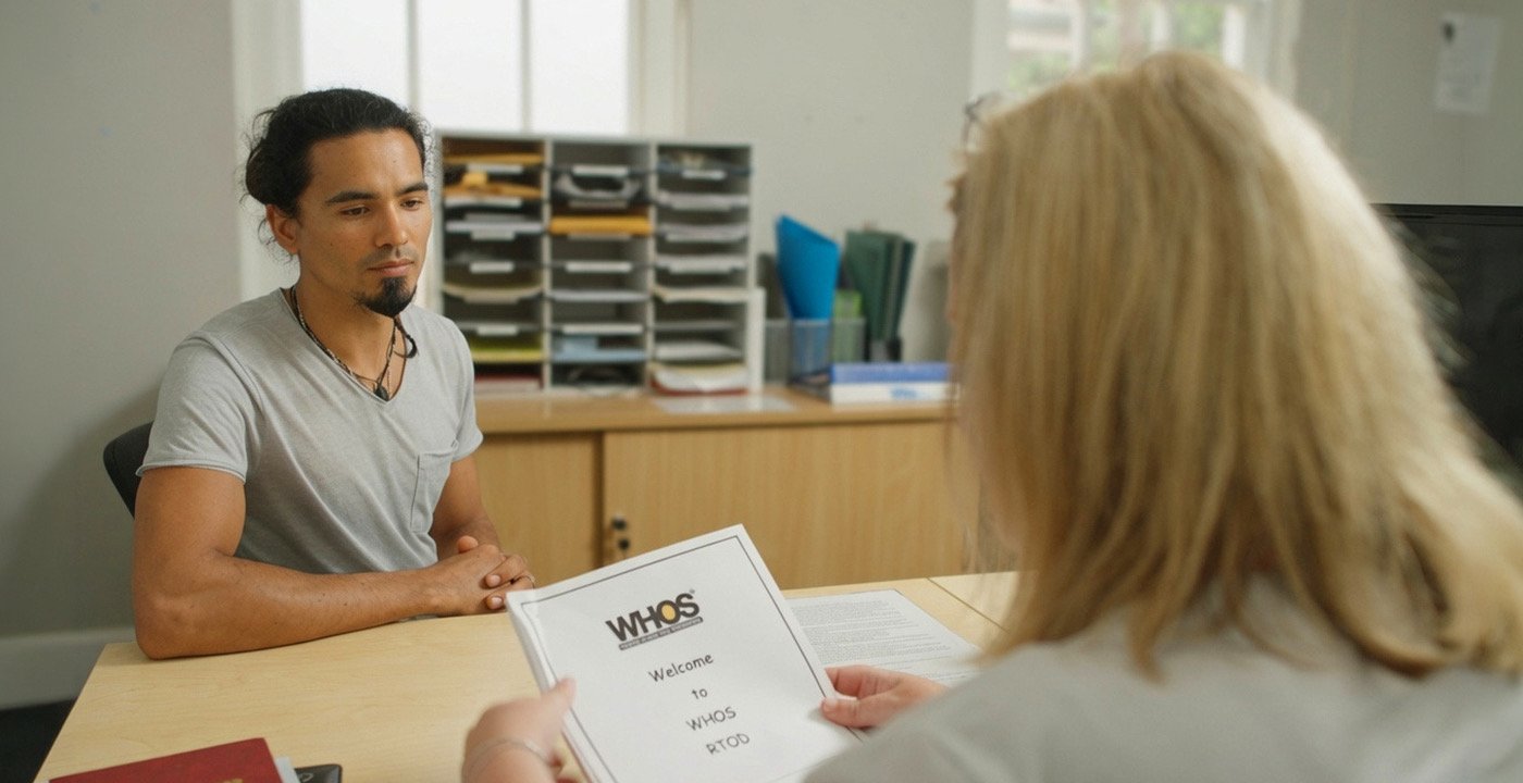 A WHOS staff member welcoming a person to an OTP Residential Program.